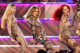 Jennifer Lopez, center, performs at the American Music Awards at the Microsoft Theater on Sunday, Nov. 22, 2015, in Los Angeles. (Photo by Matt Sayles/Invision/AP)