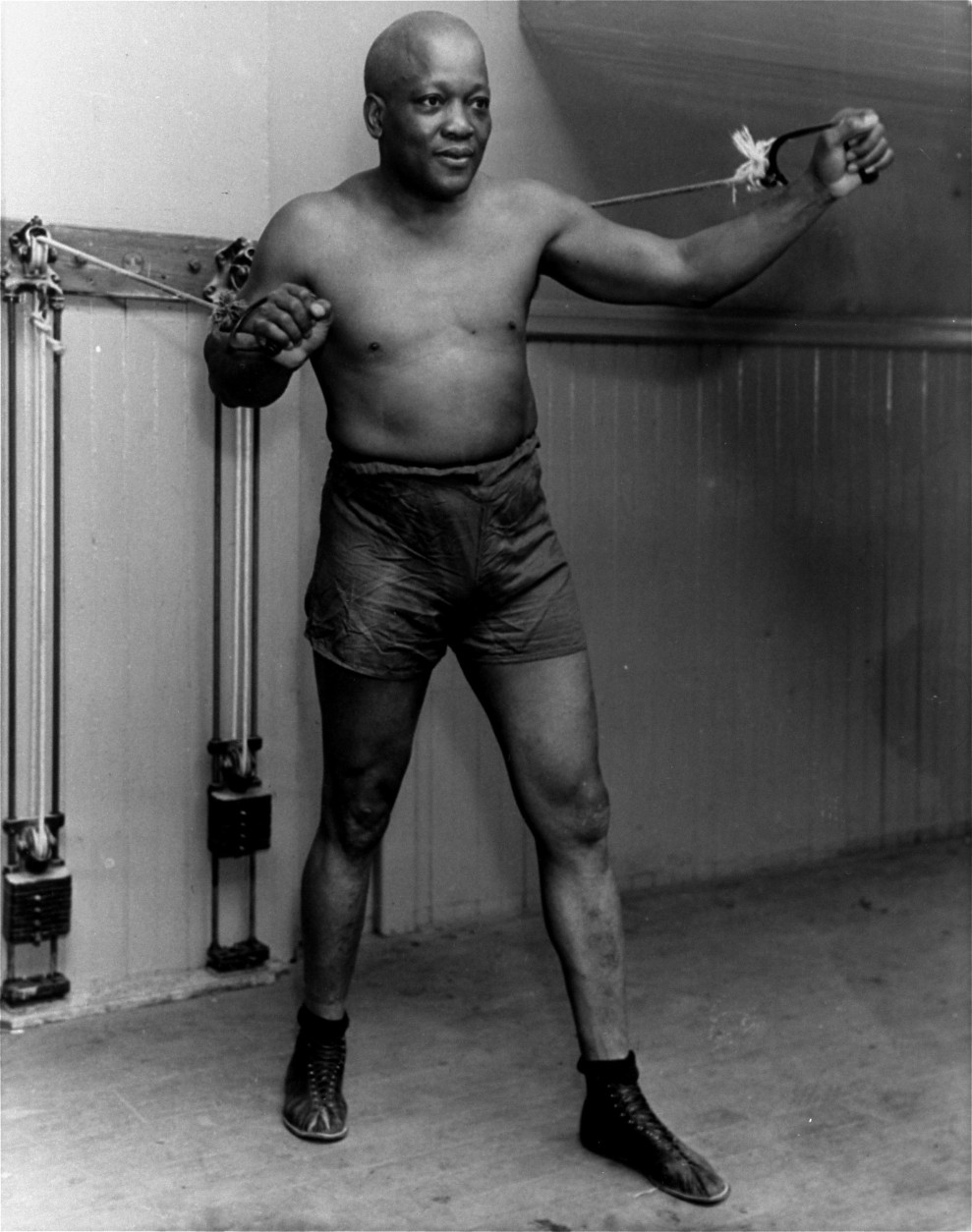**FILE** Boxer Jack Johnson is shown working out in New York City in this 1932 file photo at the age of 54. Johnson's largely unknown 1911 musings to a French sports magazine, including candid observations on racism likely never intended for American readers, have been translated to English in their entirety for the first time in the new autobiography "My Life &amp; Battles."  (AP Photo, File)
