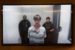 FOR USE AS DESIRED, YEAR END PHOTOS - FILE - Dylann Roof appears at a bond hearing court in North Charleston, S.C., June 19, 2015. Roof is accused of killing nine people inside Emanuel African Methodist Episcopal Church in Charleston on June 17. (Grace Beahm/The Post And Courier via AP, POOL, File)