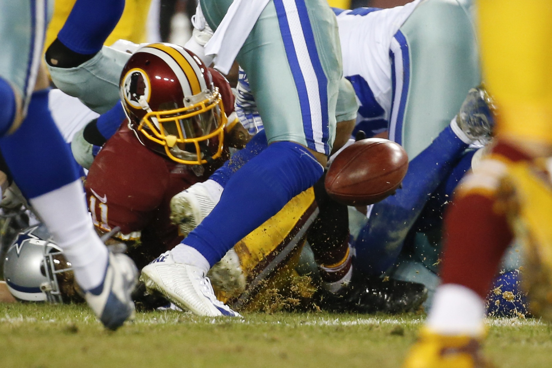 Washington Redskins wide receiver DeSean Jackson (11) fumbles the ball on a kickoff return setting up a Dallas Cowboys touchdown during the second half of an NFL football game in Landover, Md., Monday, Dec. 7, 2015. The Cowboys defeated the Redskins 19-16. (AP Photo/Alex Brandon)