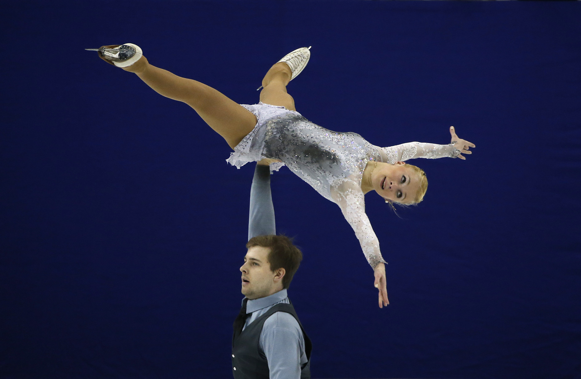 Maria Paliakova and Nikita Bochkov of Belarus perform during the Pairs Short Program in the ISU World Figure Skating Championship 2015 held at the Oriental Sports Center in Shanghai, China, Wednesday, March 25, 2015. (AP Photo/Ng Han Guan)