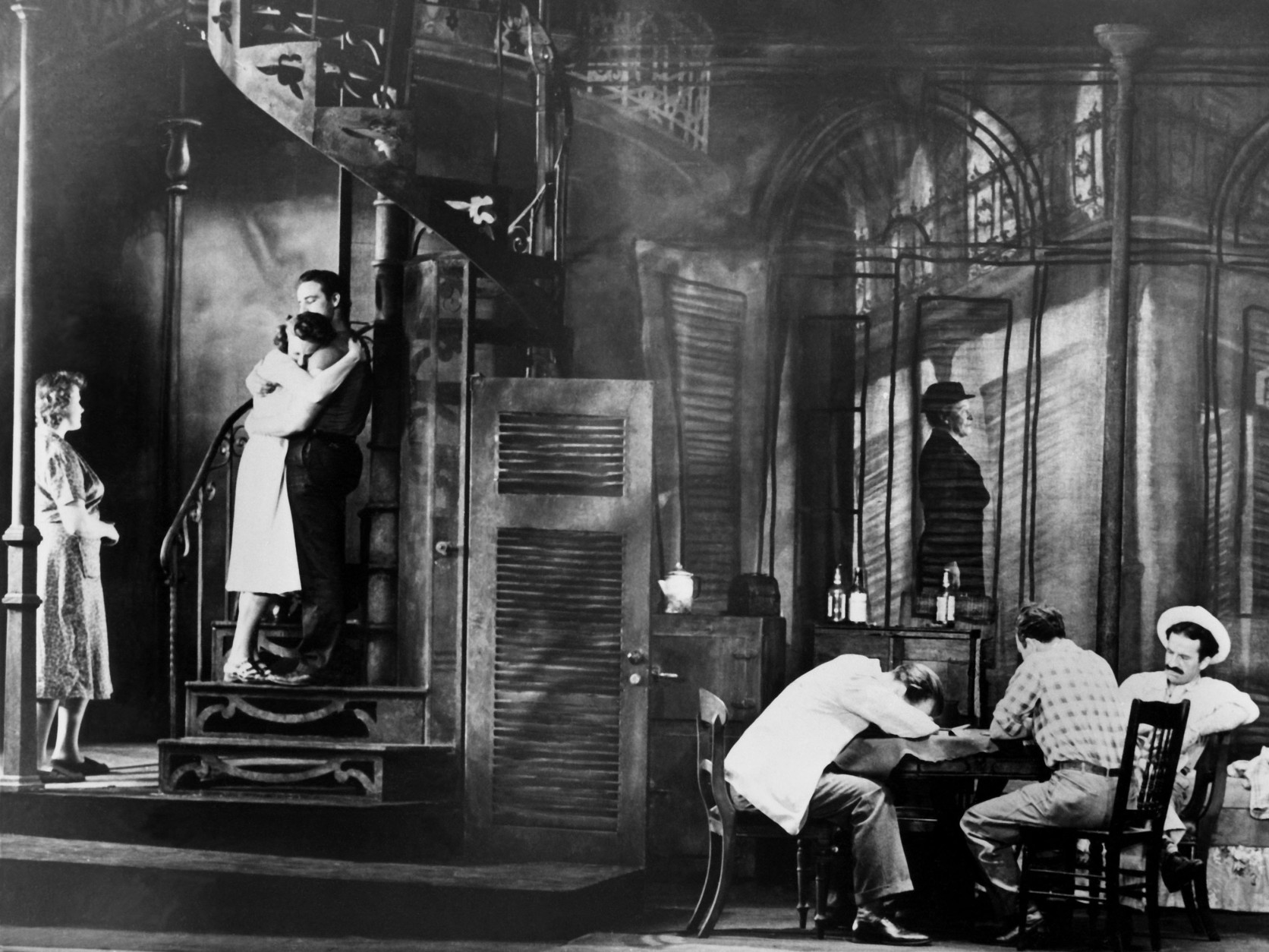 The final scene of the original Broadway production of Tennessee Williams' play " A Streetcar Named Desire," is shown on December 17, 1947, in New York City. The cast includes Marlon Brando as Stanley Kowalski, Kim Hunter as Stella, and Jessica Tandy as Blanche. (AP Photo)