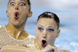 Members of Argentina's synchronized swimming team perform during technical routine competition for the Pan Am Games in Toronto, Thursday, July 9, 2015. (AP Photo/Gregory Bull)