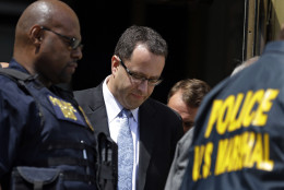 FOR USE AS DESIRED, YEAR END PHOTOS - FILE - Former Subway pitchman Jared Fogle leaves the Federal Courthouse in Indianapolis, Wednesday, Aug. 19, 2015, following a hearing on child-pornography charges. Fogle agreed to plead guilty to allegations that he paid for sex acts with minors and received child pornography in a case that destroyed his career at the sandwich-shop chain and could send him to prison for more than a decade.  (AP Photo/Michael Conroy, File)