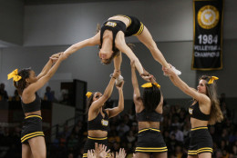 The VCU cheerleaders perform during the second half of an NCAA college basketball game in Richmond, Va., Saturday, Jan. 10, 2015.  VCU won the game 89-74. (AP Photo/Skip Rowland)