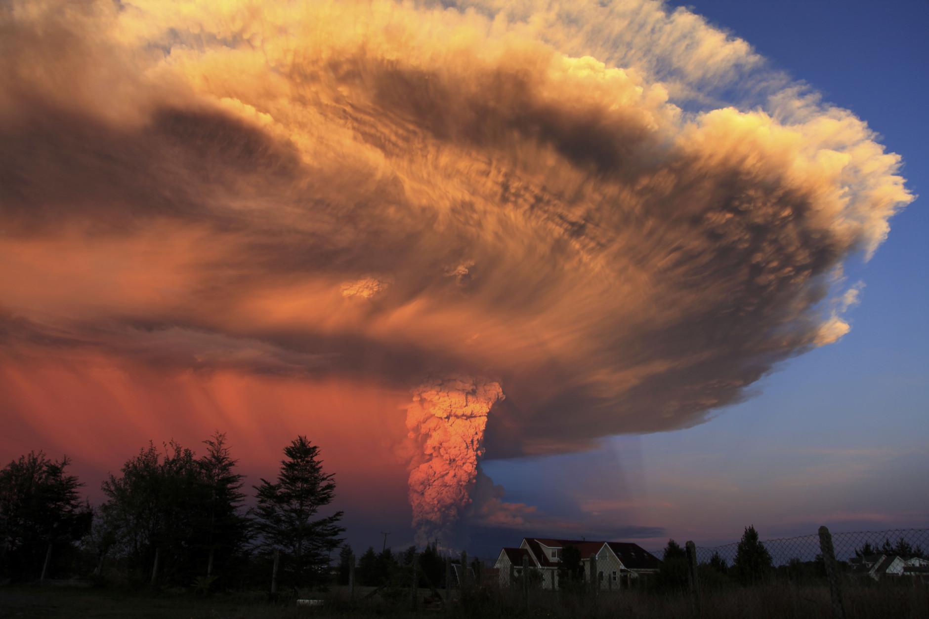 FOR USE AS DESIRED, YEAR END PHOTOS - FILE - The Calbuco volcano erupts near Puerto Varas, Chile, Wednesday, April 22, 2015. The volcano erupted for the first time in more than 42 years, billowing a huge ash cloud over a sparsely populated, mountainous area in southern Chile. (AP Photo/Diego Main/Aton Chile, File) CHILE OUT - NO USAR EN CHILE