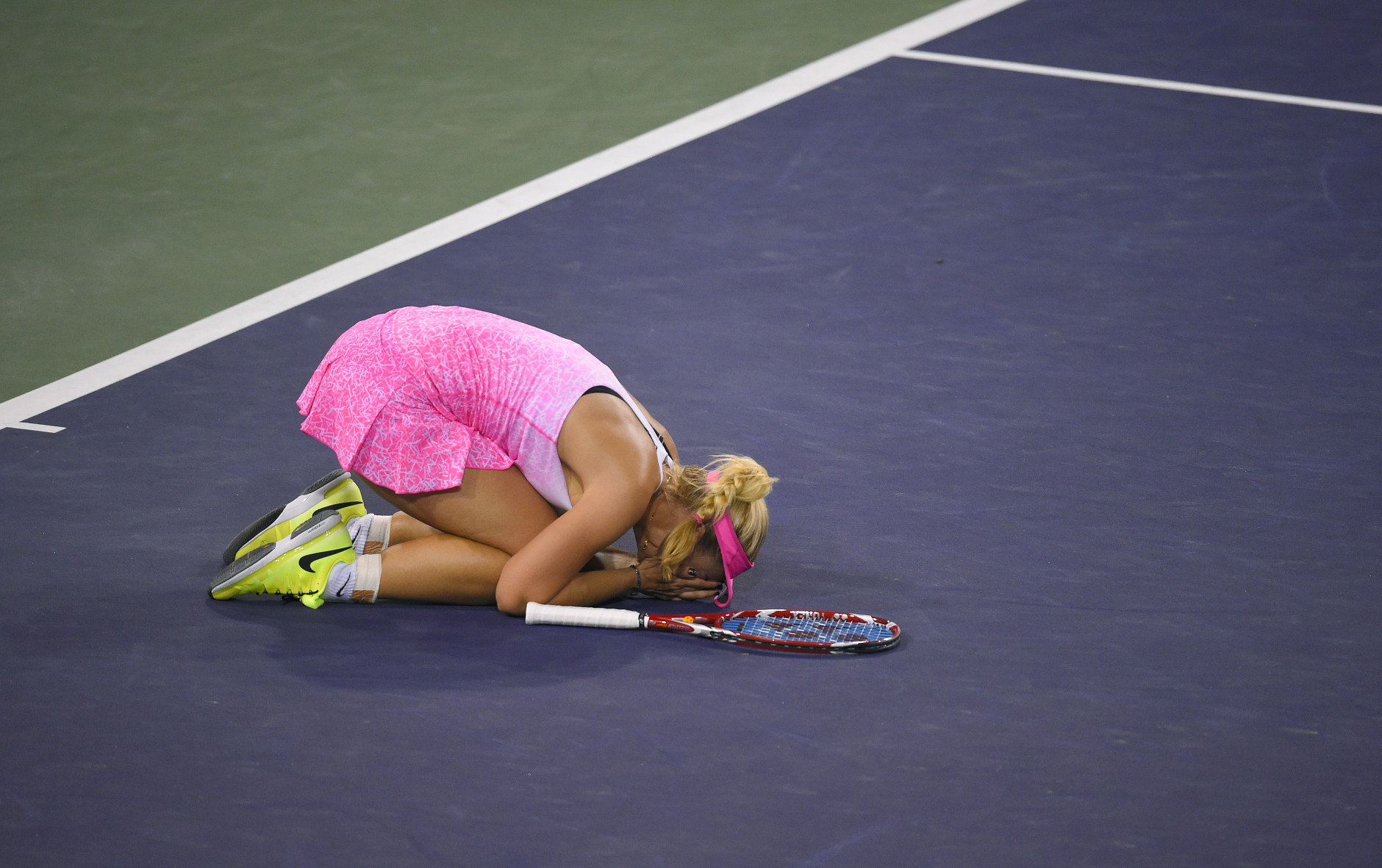 Sabine Lisicki, of Germany, celebrates after defeating Flavia Pennetta, of Italy, in their match at the BNP Paribas Open tennis tournament, Thursday, March 19, 2015, in Indian Wells, Calif. (AP Photo/Mark J. Terrill)