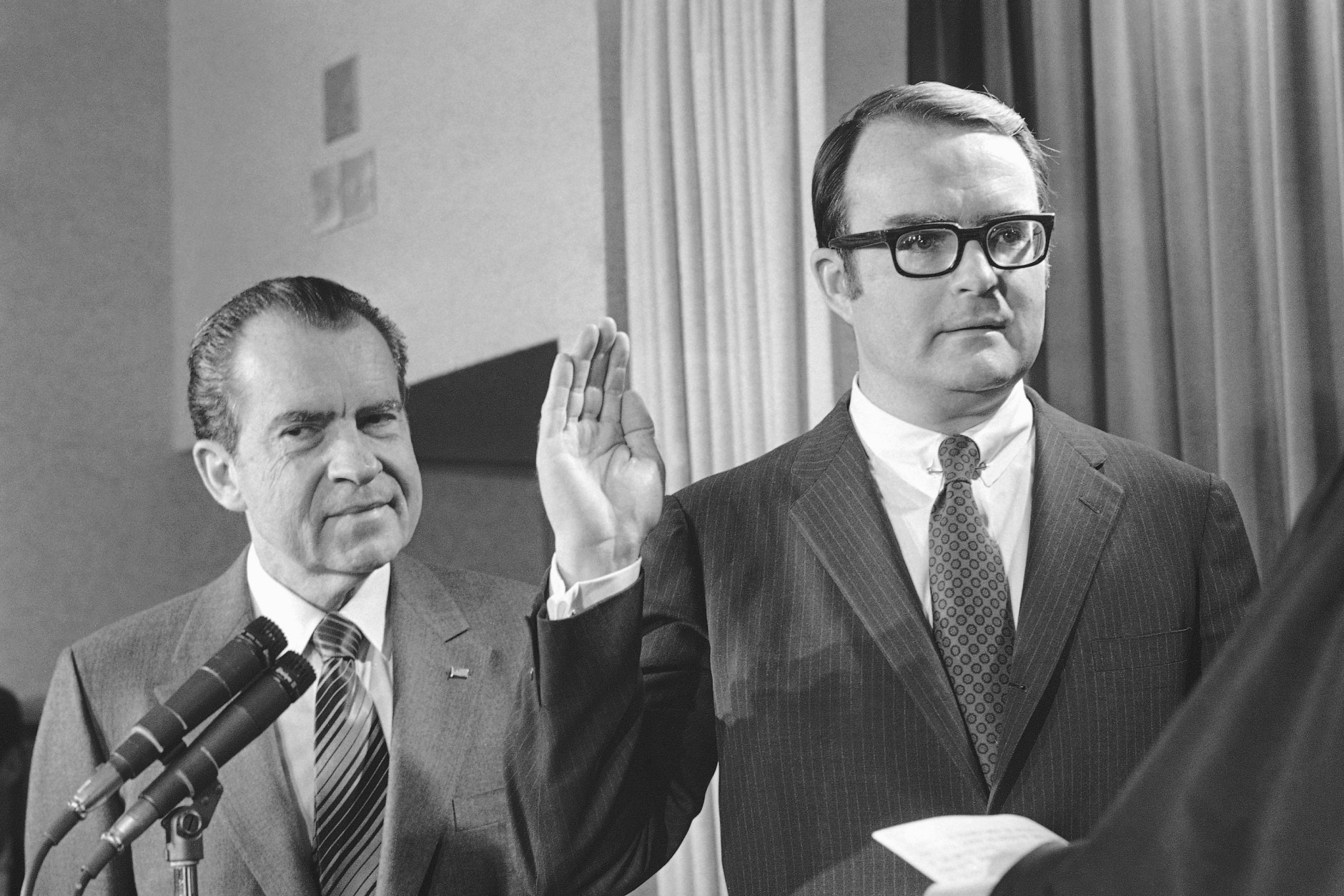 William D. Ruckelshaus is sworn in as administrator of the new Environmental Protection Agency with President Richard Nixon behind him in the White House ceremony in Washington on Dec. 4, 1970. (AP Photo/Charles Tasnadi)