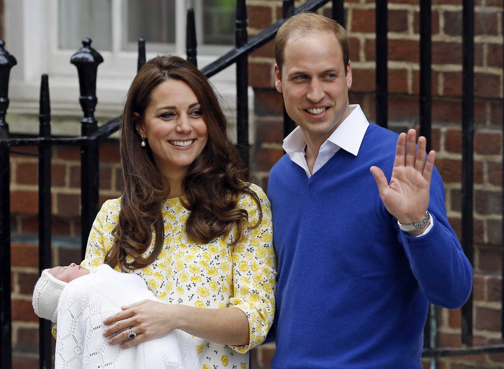 FOR USE AS DESIRED, YEAR END PHOTOS - FILE - Britain's Prince William and Kate, Duchess of Cambridge and their newborn baby princess, pose for the media as they leave St. Mary's Hospital's exclusive Lindo Wing, London, Saturday, May 2, 2015. (AP Photo/Kirsty Wigglesworth, File)