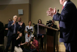 FOR USE AS DESIRED, YEAR END PHOTOS - FILE - Miami-based Univision anchor Jorge Ramos, left, asks Republican presidential candidate Donald Trump a question about his immigration proposal during a news conference, Tuesday, Aug. 25, 2015, in Dubuque, Iowa. Ramos was later removed from the room. (AP Photo/Charlie Neibergall, File)