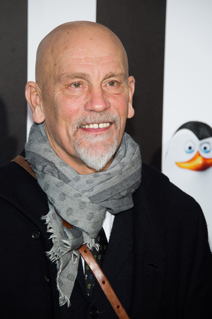 John Malkovich attends the premiere of "Penguins of Madagascar" on Sunday, Nov. 16, 2014 in New York. (Photo by Charles Sykes/Invision/AP)