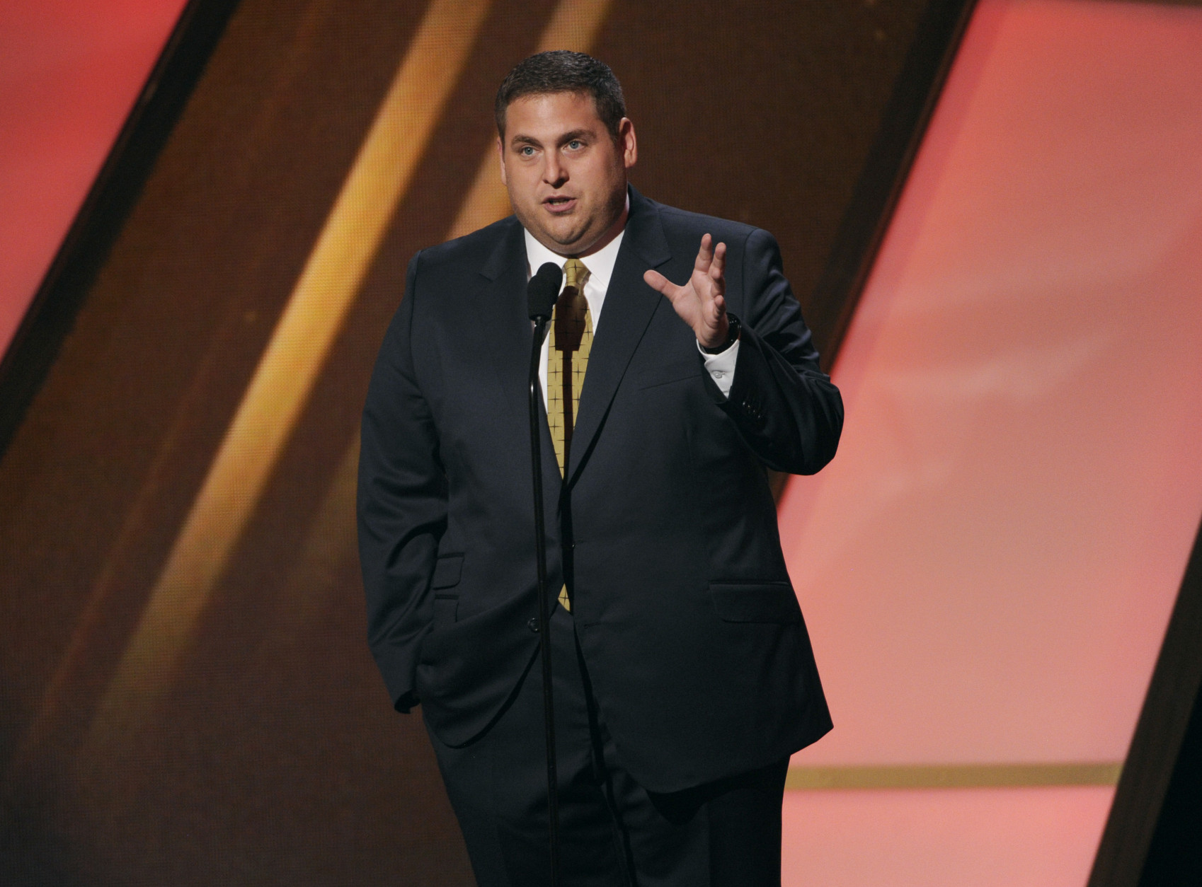 Jonah Hill presents the Hollywood ensemble award on stage at the Hollywood Film Awards at the Palladium on Friday, Nov. 14, 2014, in Los Angeles. (Photo by Chris Pizzello/Invision/AP)
