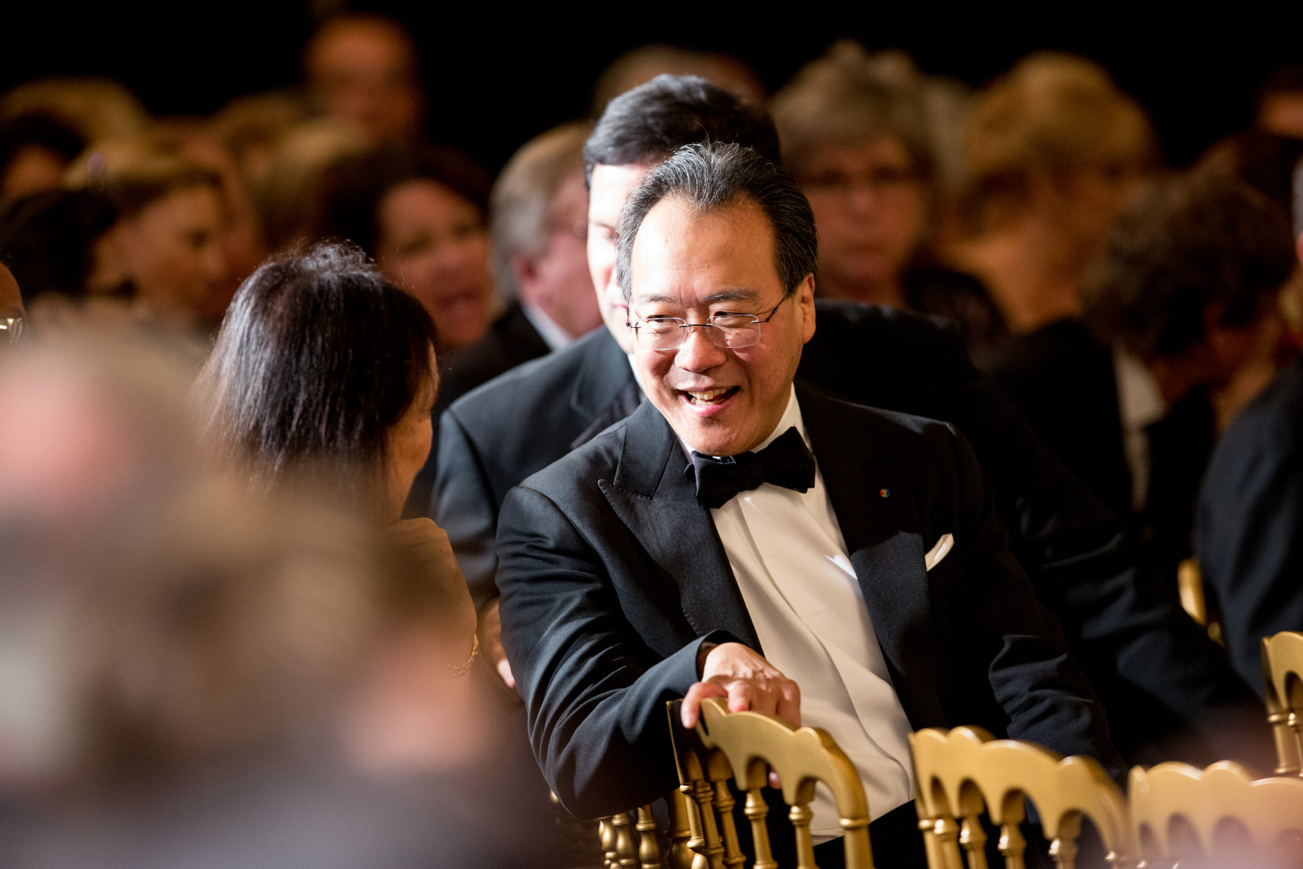 Chinese American cellist Yo-Yo Ma arrives at the 2015 Kennedy Center Honors reception in the East Room of the White House, Sunday, Dec. 6, 2015, in Washington. The 2015 Kennedy Center Honors Honorees are singer-songwriter Carole King, filmmaker George Lucas, actress and singer Rita Moreno, conductor Seiji Ozawa, and actress Cicely Tyson. (AP Photo/Andrew Harnik)