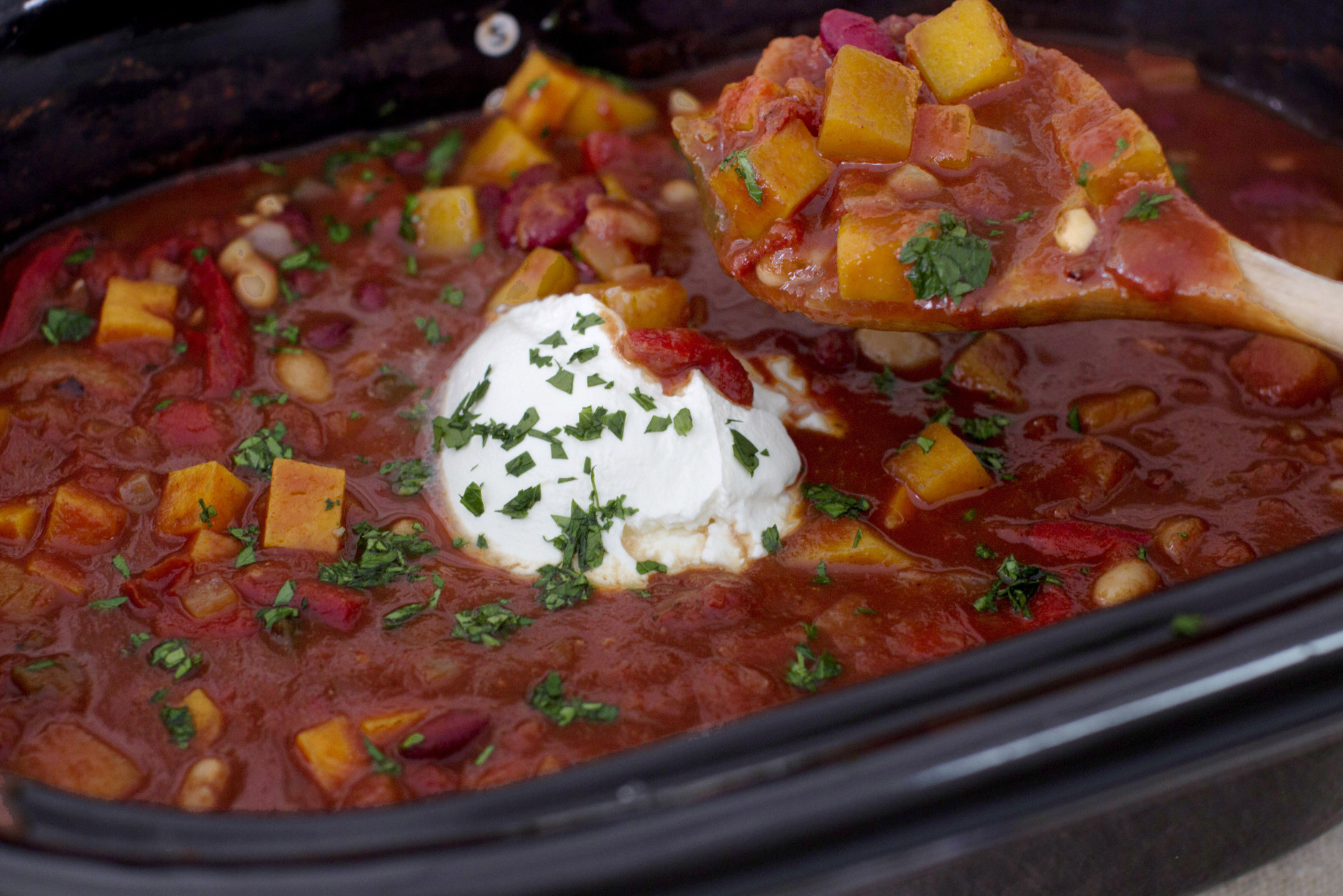 This Sept. 29, 2014 photo shows smoky slow cooker vegetarian chili in Concord, N.H. No browning or other pots needed for this dump-and-go vegetarian chili that truly takes just 10 minutes to assemble. (AP Photo/Matthew Mead)