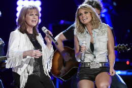 Patty Loveless, left, and Miranda Lambert perform together at "ACM Presents: Superstar Duets" at Globe Life Park on Saturday, April 18, 2015, in Arlington, Texas. (Photo by Chris Pizzello/Invision/AP)