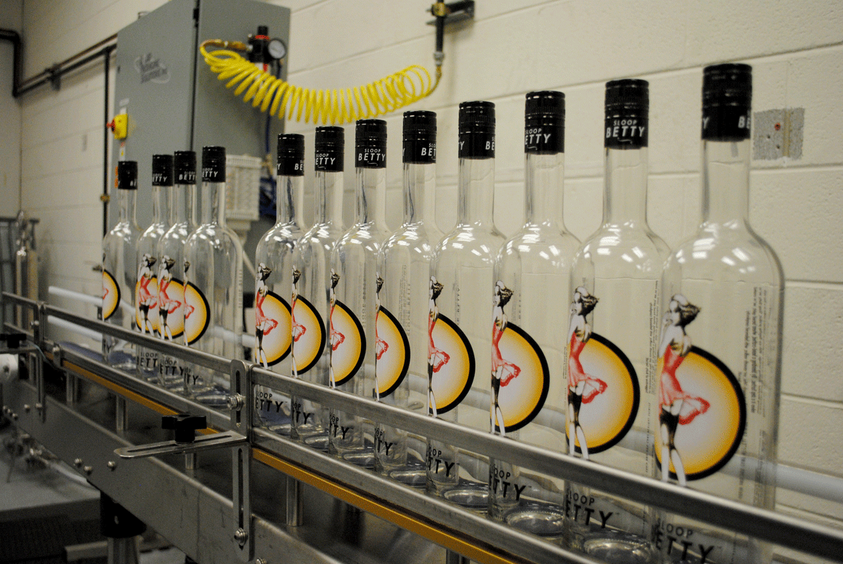 Blackwater Distilling’s Sloop Betty ready and lined up to be bottled at around 12 or 13 percent alcohol content (Capital News Service photo by Marissa Horn).