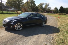 The Cadillac ATS still has modern standout looks with sharp angles and cool looking headlights that stretch from the bumper up to the hood. (WTOP/Mike Parris)