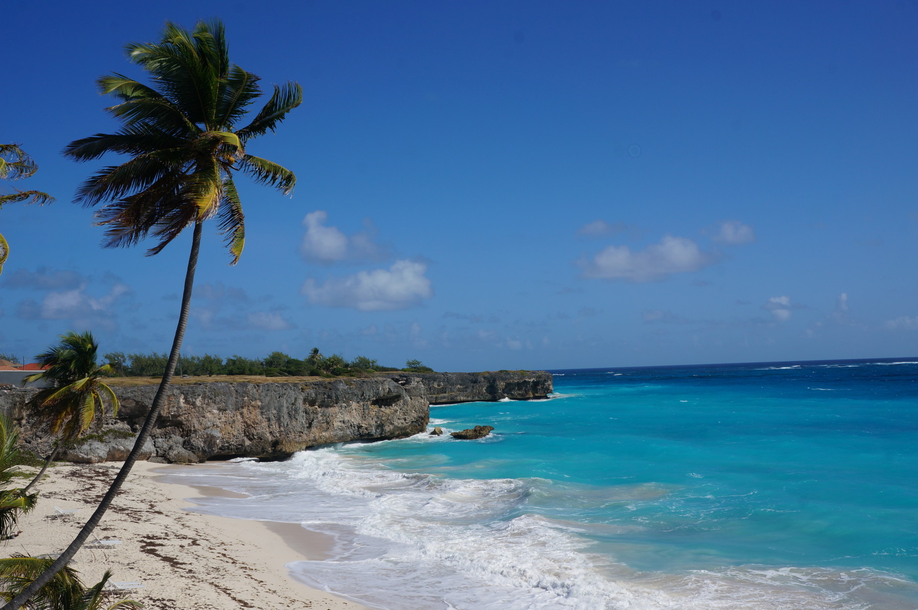 This January 2015 photo shows Bottom Bay in Barbados. The Caribbean island is relatively easy on the wallet, with easy-to-use public vans to beaches around the island, plus dining options like Oistins Fish Fry, an outdoor bazaar of restaurant shacks serving heaping plates of food. (AP Photo/Kavitha Surana)