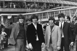 13th August 1965:  Hundreds of teenagers gather at London Airport to give pop group The Beatles a send-off before they board an aeroplane to America.  (Photo by Keystone/Getty Images)