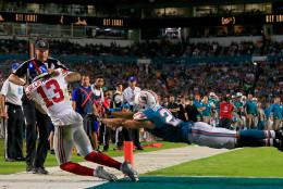 MIAMI GARDENS, FL - DECEMBER 14: Odell Beckham #13 of the New York Giants catches a touchdown pass as Brent Grimes #21 of the Miami Dolphins defends during the third quarter of the game at Sun Life Stadium on December 14, 2015 in Miami Gardens, Florida.  (Photo by Chris Trotman/Getty Images)