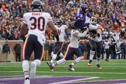 MINNEAPOLIS, MN - DECEMBER 20: Quarterback Teddy Bridgewater #5 of the Minnesota Vikings scores a touchdown against Ryan Mundy #21 of the Chicago Bears during the fourth quarter of the game on December 20, 2015 at TCF Bank Stadium in Minneapolis, Minnesota. The Vikings defeated the Bears 38-17. (Photo by Hannah Foslien/Getty Images)