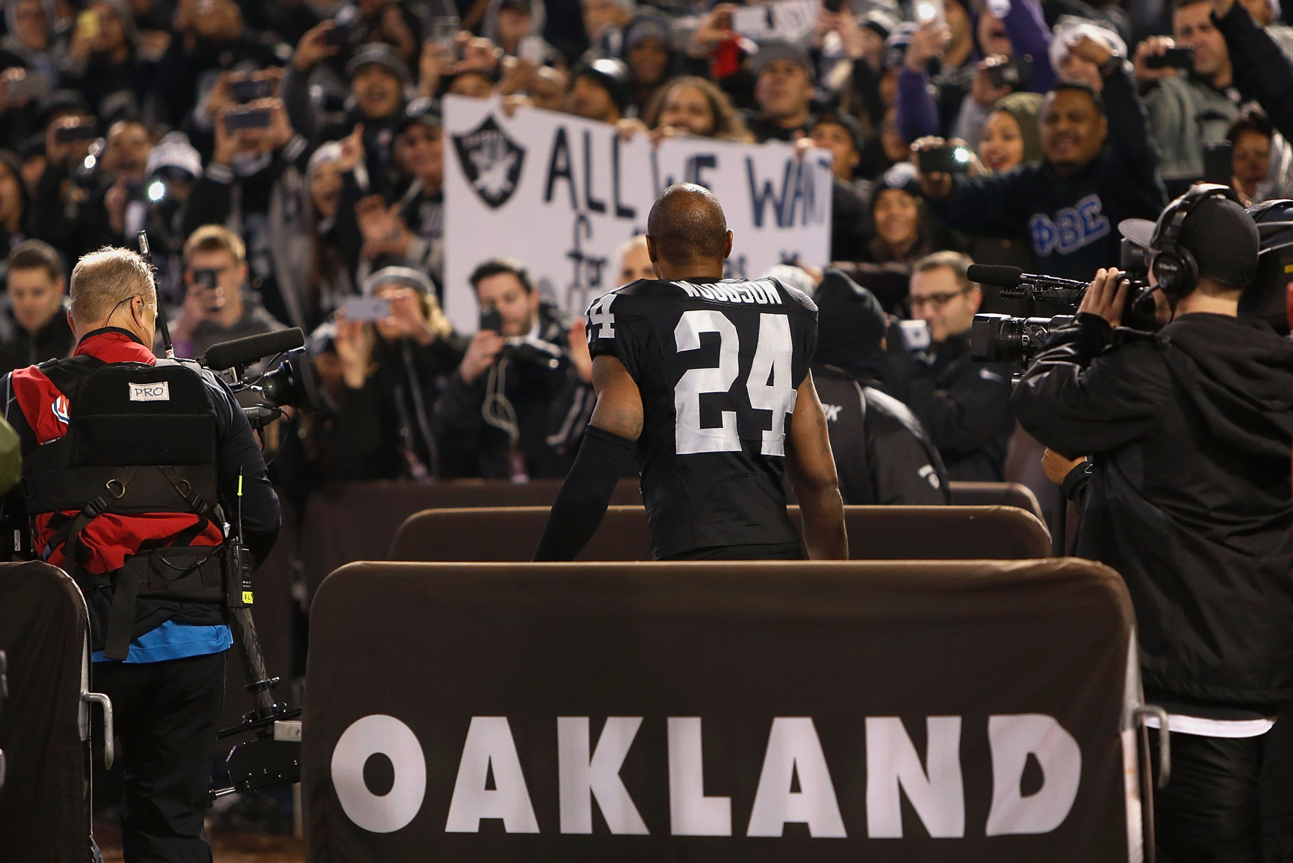 OAKLAND, CA - DECEMBER 24: Charles Woodson #24 of the Oakland Raiders enters the field before the game against the San Diego Chargers at O.co Coliseum on December 24, 2015 in Oakland, California.  (Photo by Lachlan Cunningham/Getty Images)