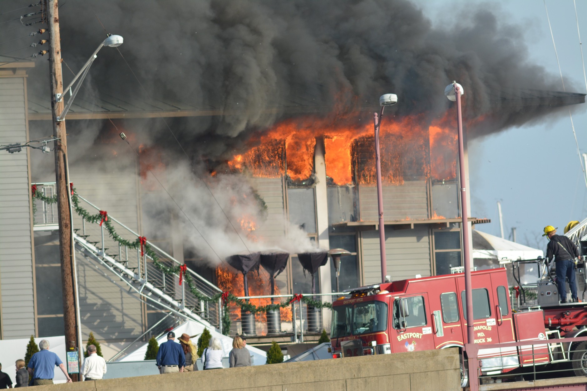 Fire fighters battle a blaze that broke out at Annapolis Yacht Club on Saturday, Dec. 12, 2015. (Photo courtesy of Bob Waugh)