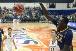 UC Irvine center Mamadou Ndiaye, right, dunks as Boston College forward A.J. Turner, left, and center Dennis Clifford watch during the second half of an NCAA college basketball game at the Wooden Legacy tournament, Friday, Nov. 27, 2015, in Fullerton, Calif. (AP Photo/Mark J. Terrill)
