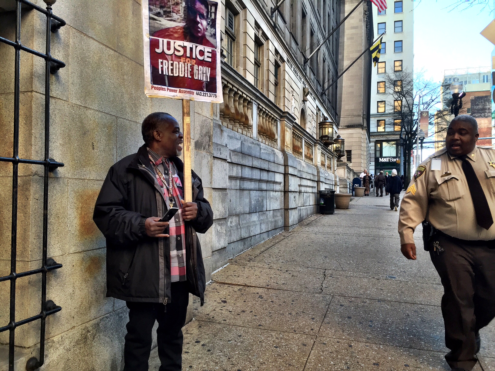 Tension, kindness outside Baltimore courthouse as jury deliberates