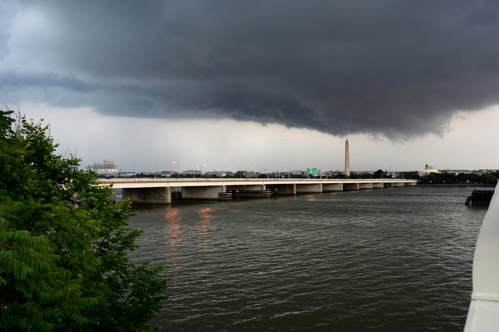 A eruption of storms led to 64 reports of severe weather across the region on Sat., June 20. Wind directions in the lower levels of the atmosphere allowed many of the storms to rotate as they churned northward across the Nation's Capital. An ominous, UFO-shaped cloud moved north along Interstate 395 from Springfield, Va. through the District during the afternoon. The storm did not produce any significant damage. (WTOP/Dave Dildine)