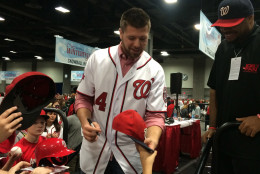 Nats reliever Blake Treinen signs autographs at Winterfest. (WTOP/Dick Uliano)