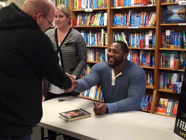 Former Baltimore Ravens linebacker and MVP recipient Ray Lewis met with fans and signed copies of his new book in D.C. Tuesday. (WTOP/Molly Welton)