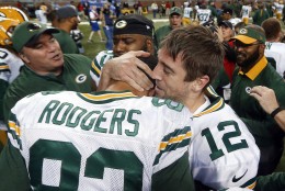 FILE - In this Dec. 3, 2015, file photo, Green Bay Packers quarterback Aaron Rodgers (12) hugs tight end Richard Rodgers (82) after their Hail Mary 61-yard touchdown throw and catch with no time remaining in an NFL football game against the Detroit Lions,  in Detroit. Coach Mike McCarthy has put blinders on the Packers. The focus is squarely on looking ahead and finishing strong.  (AP Photo/Paul Sancya, File)