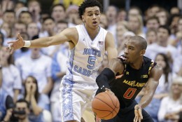North Carolina's Marcus Paige (5) guards Maryland's Rasheed Sulaimon (0) during the first half of an NCAA college basketball game in Chapel Hill, N.C., Tuesday, Dec. 1, 2015. (AP Photo/Gerry Broome)