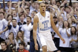 North Carolina's Brice Johnson (11) reacts following a basket against Maryland during the second half of an NCAA college basketball game in Chapel Hill, N.C., Tuesday, Dec. 1, 2015. North Carolina won 89-81. (AP Photo/Gerry Broome)