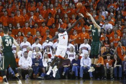Virginia guard Marial Shayok (4) defends William &amp; Mary guard Greg Malinowski (5) during the second half of an NCAA college basketball game in Charlottesville, Va., on Saturday, Dec. 5, 2015. (AP Photo/Ryan M. Kelly)