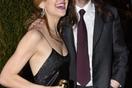 Award-winner Kate Hudson, left, celebrates with husband Chris Robinson of the rock group Black Crows at the Dreamworks Studios party following the 58th Annual Golden Globe Awards in Beverly Hills, Calif., Sunday, Jan. 21, 2001. Hudson won best supporting actress in a comedy for her role in the film "Almost Famous." (AP Photo/Kevork Djansezian)