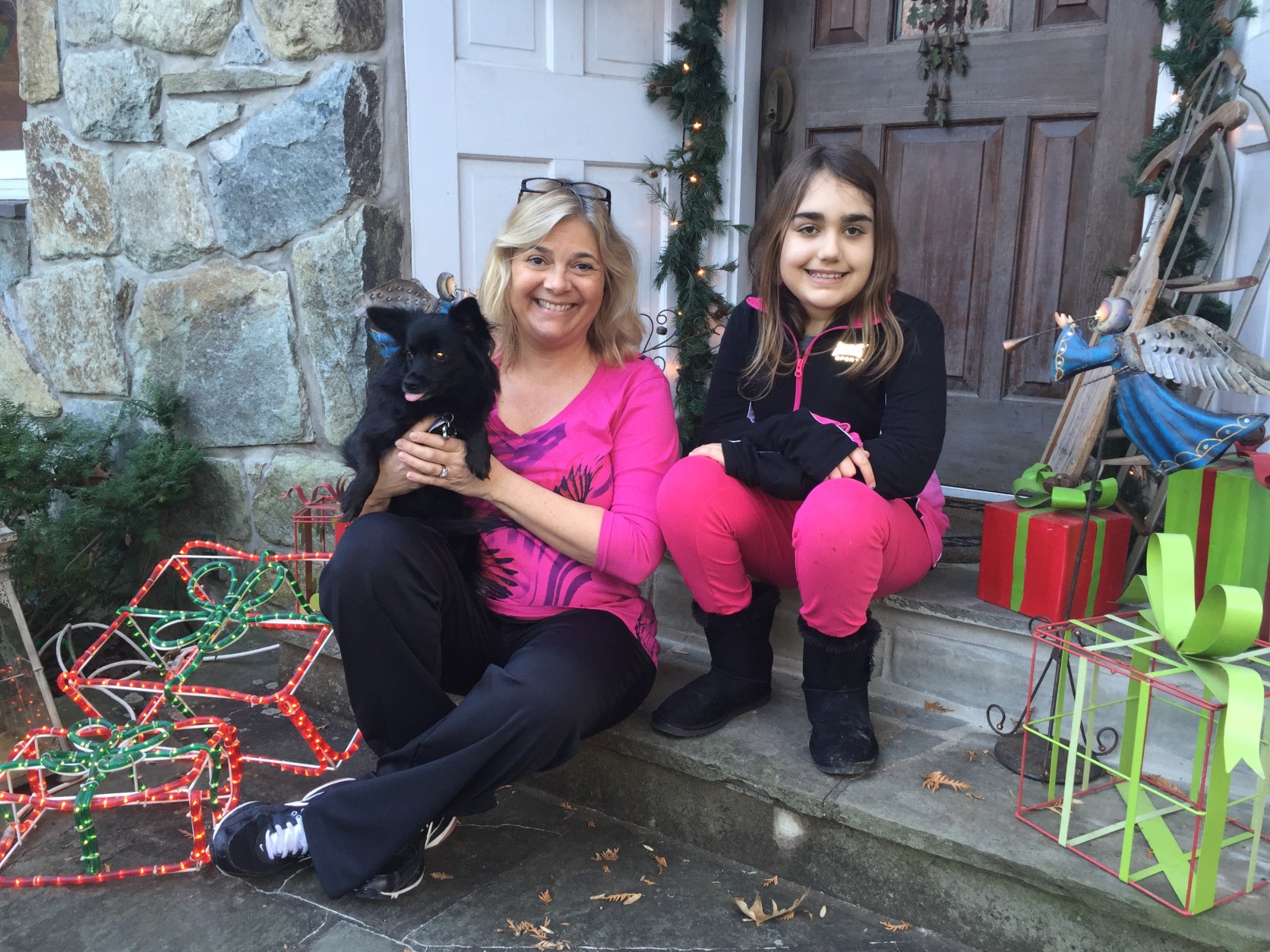 Natasha Troike 11, her mother, Lisa Patterson Troike, and the family dog Lexi. (WTOP/Kristi King)