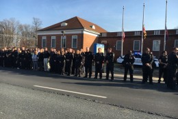 A police procession for Officer Noah Leotta took place Thursday afternoon with a brief pause at the 4th District Wheaton Police Station located at 2300 Randolph Road. (WTOP/Kate Ryan)