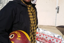 Tiffany Burke found some of the gifts for her kids during the Toys for Tots event at Prince George’s County police headquarters on Saturday, Dec. 19, 2015. (WTOP/Allison Keyes)