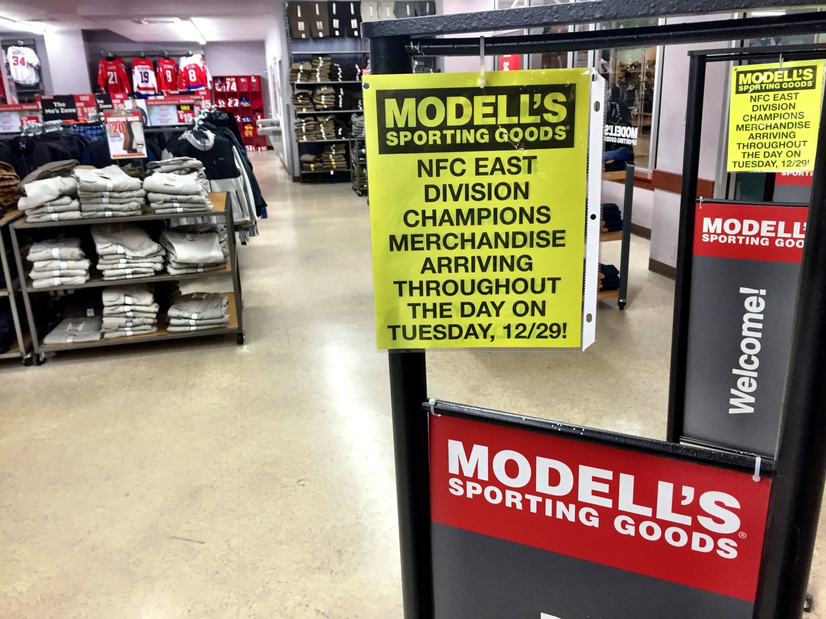 "It's the first time in three years, so there's a lot of excitement here," said Mark Siegel, general manager of the Modells sporting goods store in Pentagon Center. Siegel says he and his employees have been fielding phone calls in the past 24 hours, after it was announced playoff merchandise would be delivered Tuesday. (WTOP/Neal Augenstein)