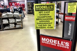 "It's the first time in three years, so there's a lot of excitement here," said Mark Siegel, general manager of the Modells sporting goods store in Pentagon Center. Siegel says he and his employees have been fielding phone calls in the past 24 hours, after it was announced playoff merchandise would be delivered Tuesday. (WTOP/Neal Augenstein)