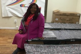 Ruby Corado sits inside the new shelter she always dreamed of opening after she saw the need for a safe place when she was homeless in D.C. years ago. (Courtesy of Ruby Corado)