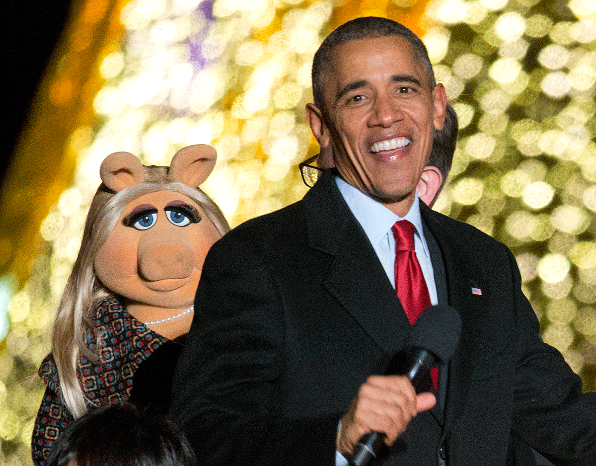 President Barack Obama and Miss Piggy onstage during the National Christmas Tree Lighting ceremony at the Ellipse in Washington, Thursday, Dec. 3, 2015. (AP Photo/Pablo Martinez Monsivais)