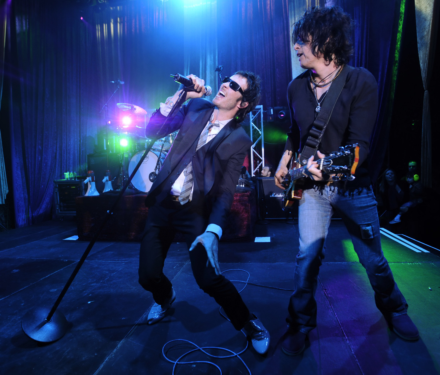Scott Weiland, left, and Dean DeLeo of Stone Temple Pilots perform at a special private performance in Los Angeles, Monday, April 7, 2008. The band announced that they will be reuniting and will launch their first national tour in almost eight years. (AP Photo/Chris Pizzello)