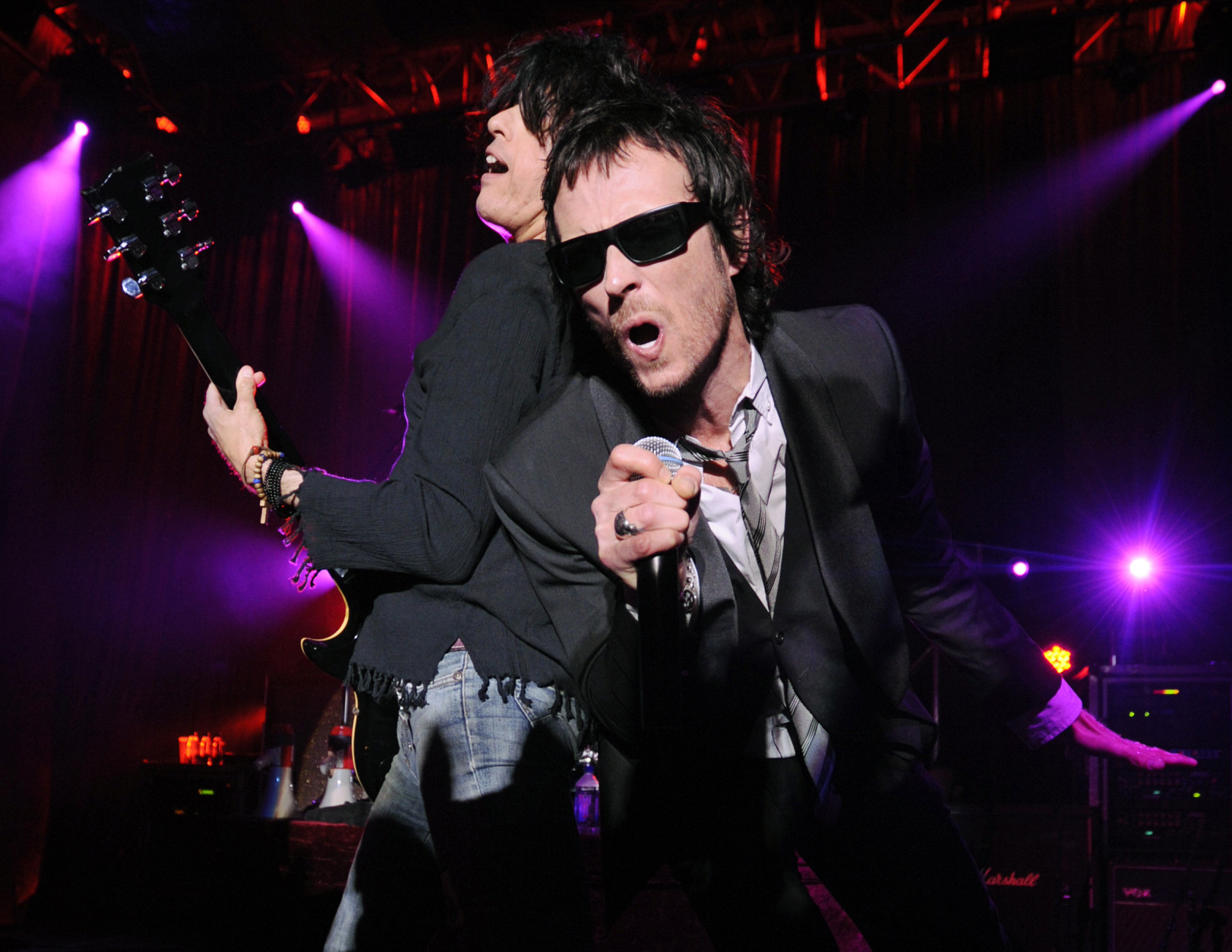 ** FILE ** Scott Weiland, right, and Dean DeLeo of Stone Temple Pilots perform at a special private performance in Los Angeles, April 7, 2008. The band announced that they will be reuniting and will launch their first national tour in almost eight years. (AP Photo/Chris Pizzello)
