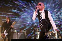 Scott Weiland, singer for the rock band Stone Temple Pilots, right, and bass player Robert DeLeo perform during their concert as part of Rock on the Range in Columbus, Ohio Saturday, May 17, 2008. The group, which broke up in 2003, kicked off a 65-date reunion tour at the show. (AP Photo/Paul Vernon)