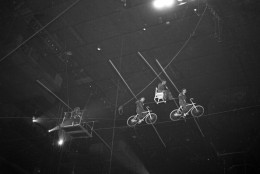 The Flying Wallendas start on their hazardous routine on tight wire high up in the Garden dome. Herman Wallenda is the man on the second bicycle. Wife left act in April after whole troupe came close to disaster due to Herman's emotional upset. Herman in double somersault act barely escaped death. (Photo By: Jack Tresilian/NY Daily News via Getty Images)