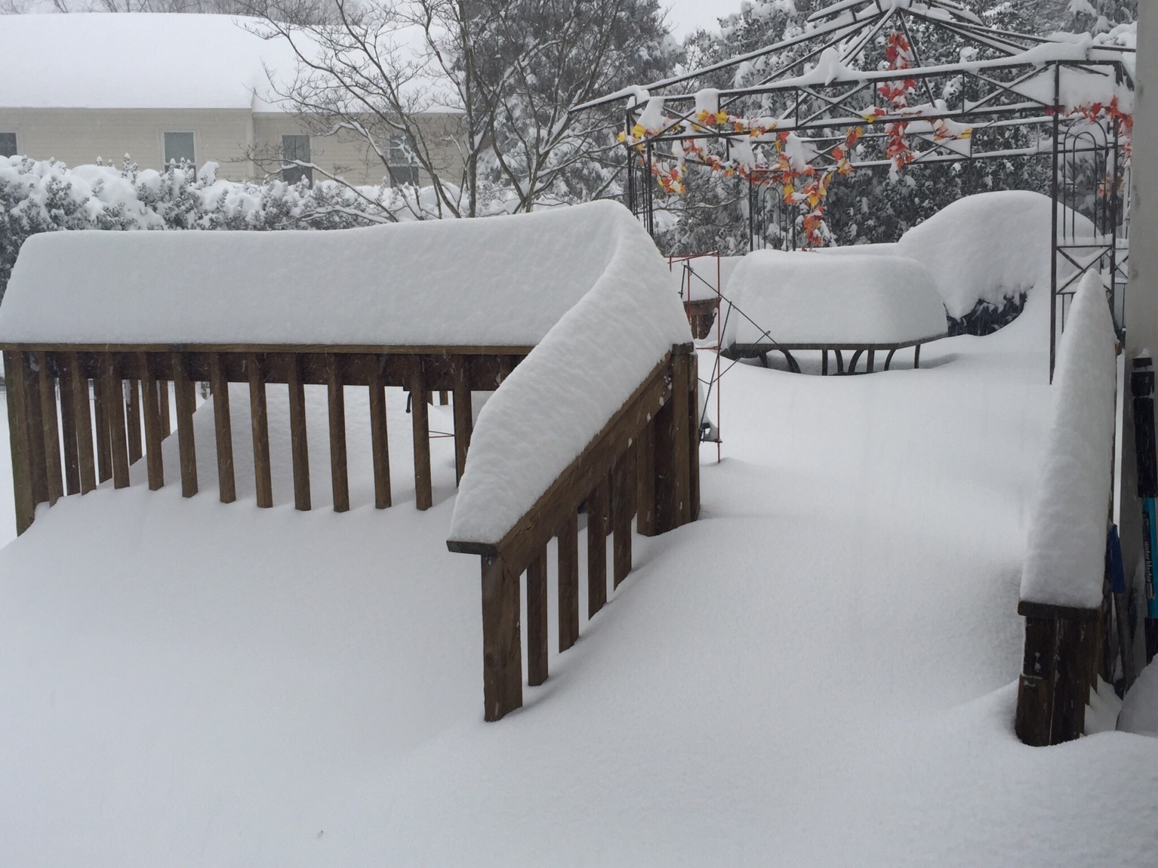 9:00 Saturday morning. 13.5" on our deck in Gaithersburg and 12 more hours to go! (Courtesy WTOP listener)