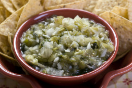 This Aug. 30, 2010 photo shows tomatillo, poblano and sweet onion salsa. Tomatillos are an often overlooked veggie that have traits similar to tomatoes and can be used raw or cooked. Grab some the next time you are at the market and try them in this salsa recipe.   (AP Photo/Larry Crowe)